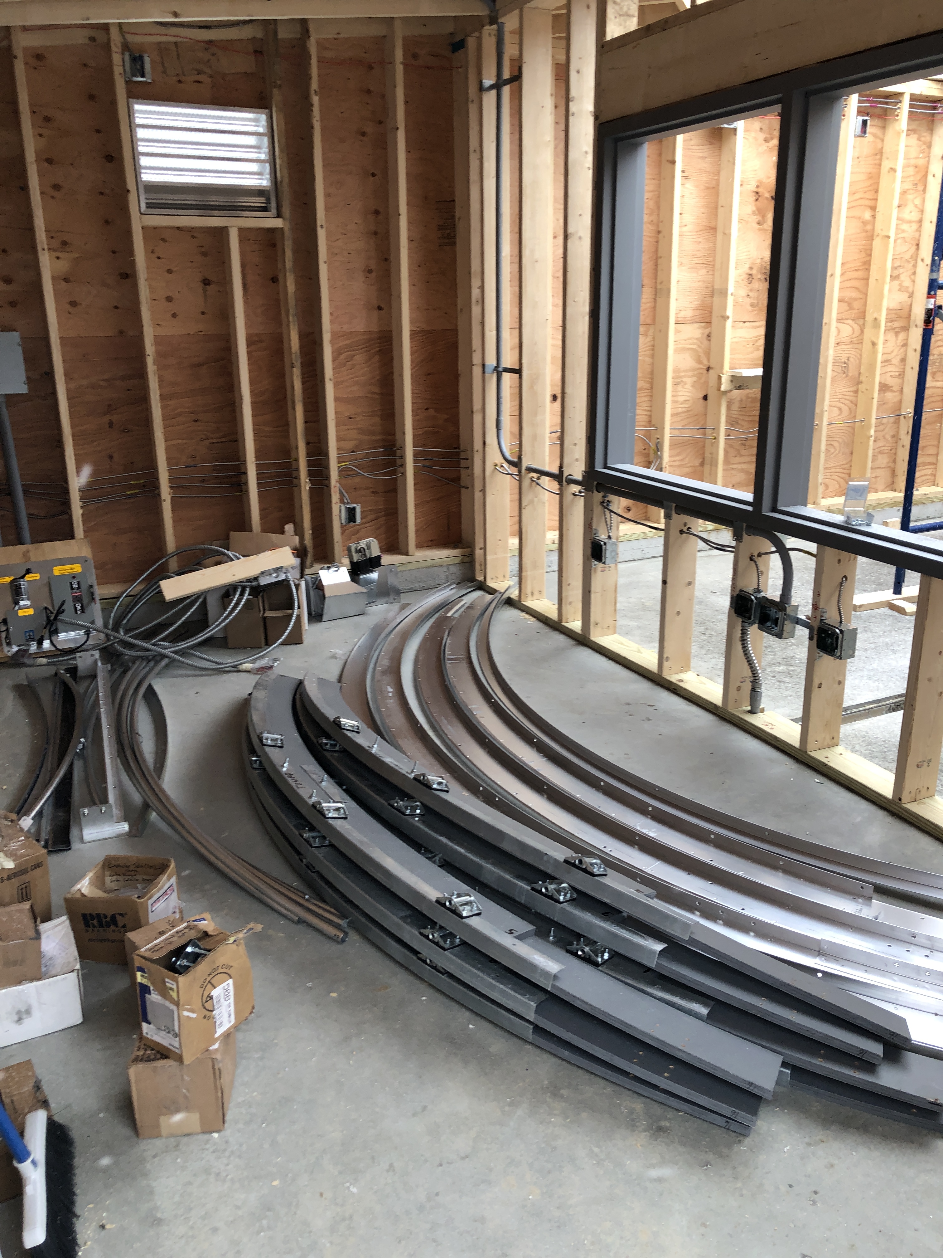 Inside the control room, the base bearings of the dome have been unpacked for inspection and comprehension! So many parts are in this package, that it is a little mystifying. 